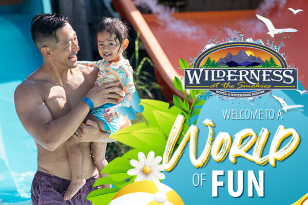 Family enjoying time together at an outdoor waterpark at Wilderness at the Smokies, with a father holding a smiling child near colorful water slides. Promotional text reads “Welcome to a World of Fun” alongside the Wilderness at the Smokies logo, tropical leaves, and summer-themed graphics.