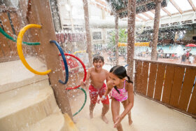 two children splashing