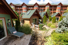 several outdoor cabanas in cabana forest in lake wilderness