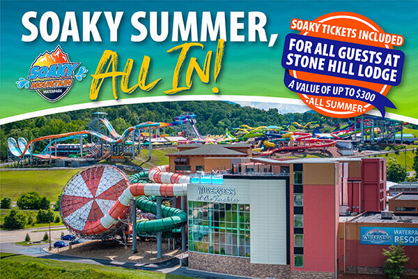 Soaky Mountain Waterpark “Soaky Summer All In!” promotional banner featuring the Soaky Mountain logo, a “View Specials” button, and a message that Soaky tickets are included for all guests at Stone Hill Lodge all summer with a value of up to $300. The banner shows an aerial view of the waterpark with colorful slides, pools, and surrounding mountain scenery.